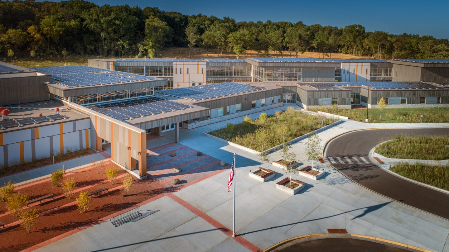 An aerial view of Forest Edge featuring its rooftop solar panels