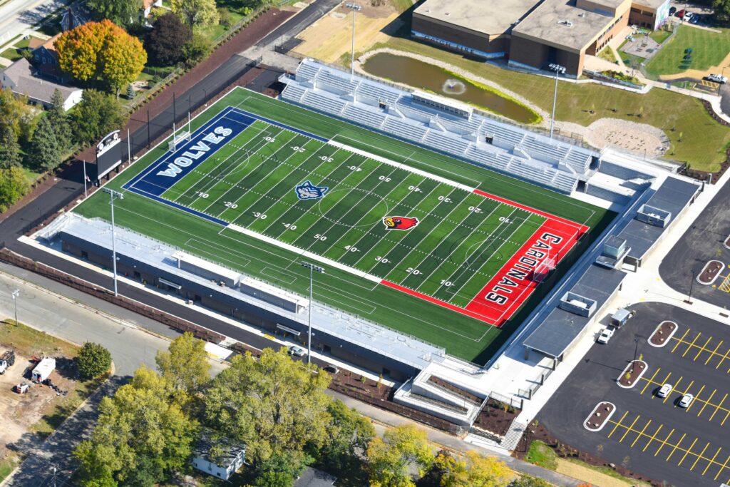 Aerial view of football stadium with ample parking