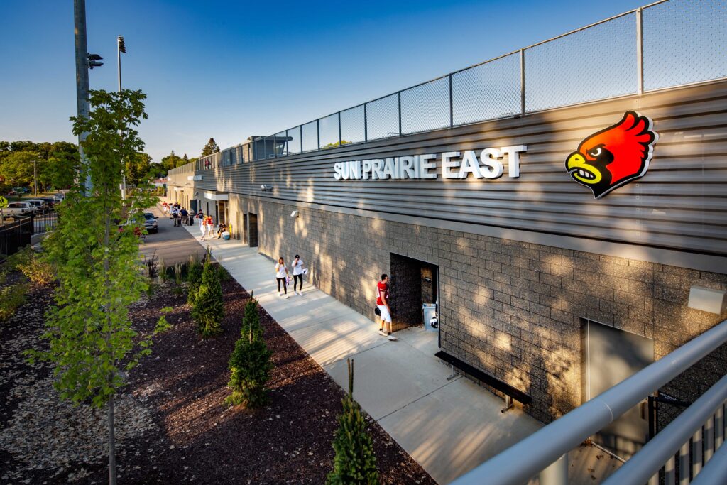 Exterior view of signage on football stadium entrances