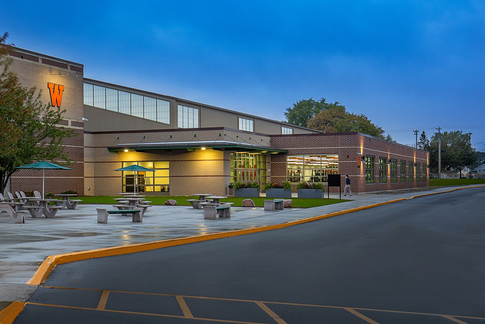 An exterior view of the fitness center and indoor athletic field addition