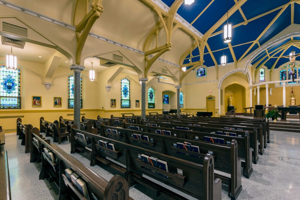 View of pews and surrounding area on left side of nave