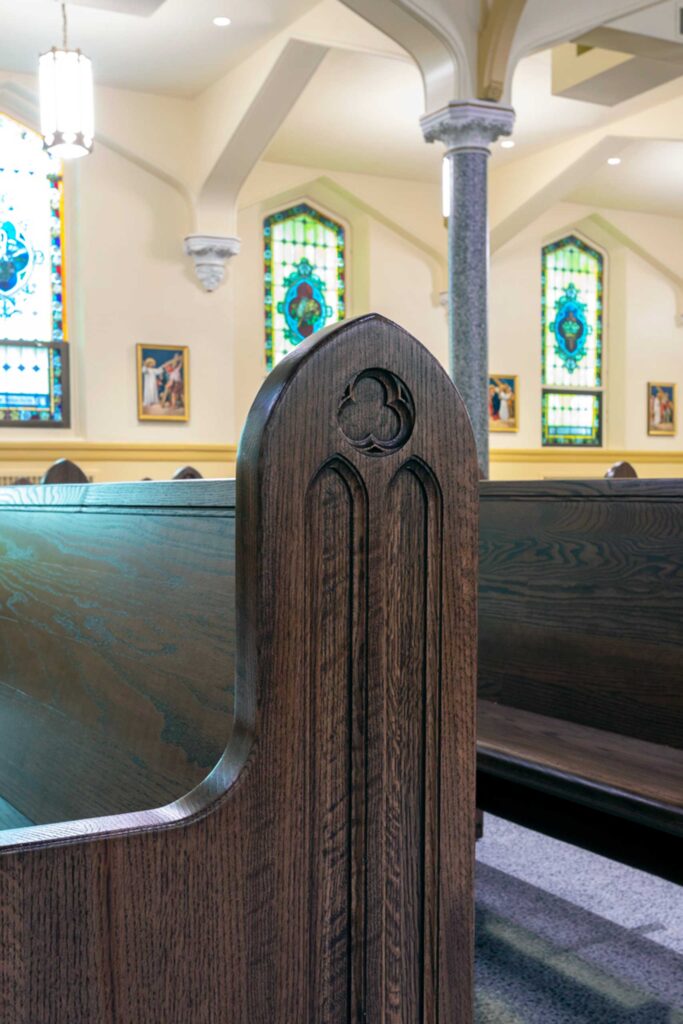 Trefoil detail on wooden pew