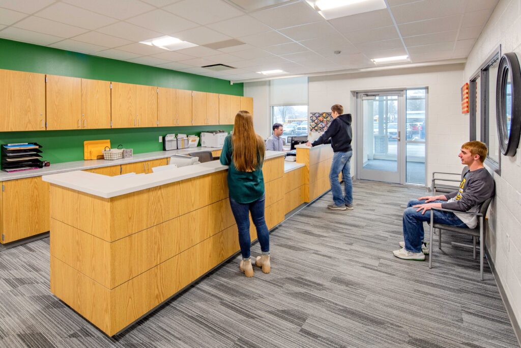 Ample storage and accessible counter space give the updated Coleman High School reception area a welcoming atmosphere for students and visitors