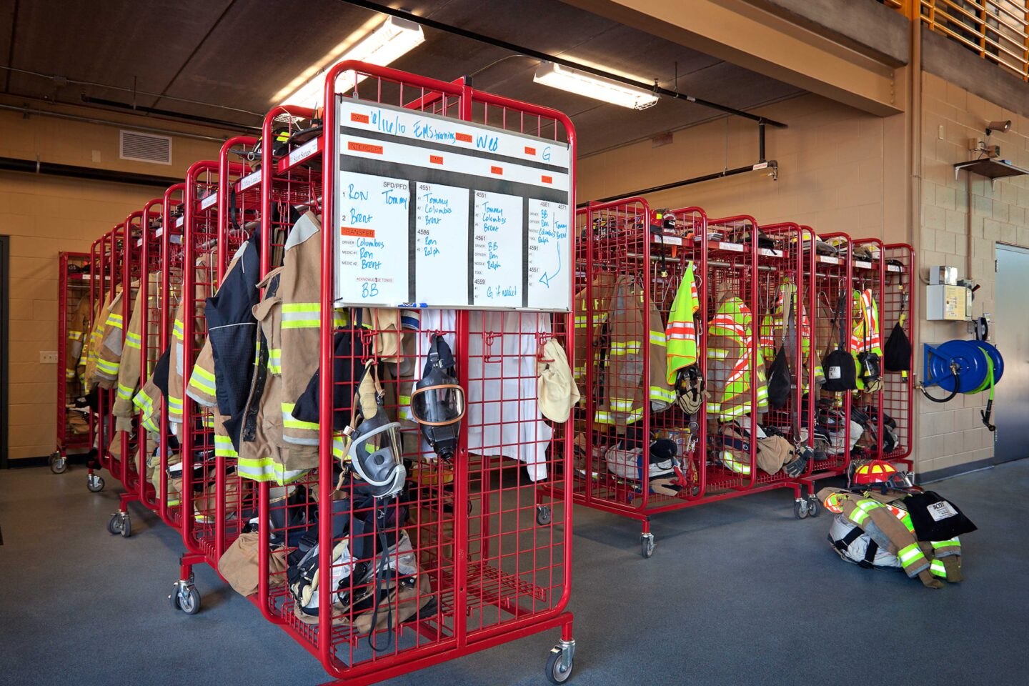 Lockers with firefighting equipment jut out of an alcove in the Delafield Public Safety Building