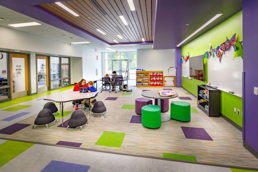 An open collaboration space with flexible furniture is outside of multiple classrooms at Eleva-Strum Elementary School
