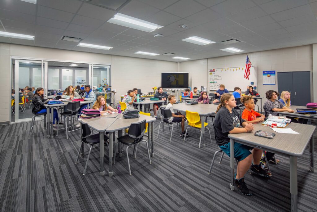 Two classrooms are connected with sliding glass doors to allow for flexible learning spaces at Horning Middle School in Waukesha