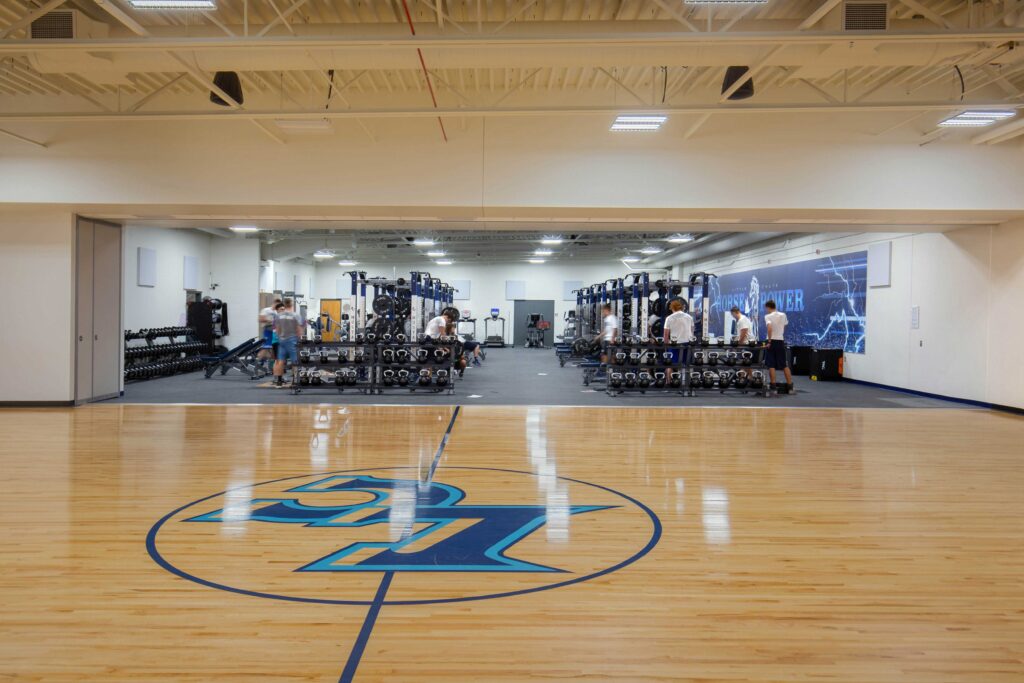 A gym floor at the Little Chute Intermediate, Middle, and High School connects into a well-equipped fitness center