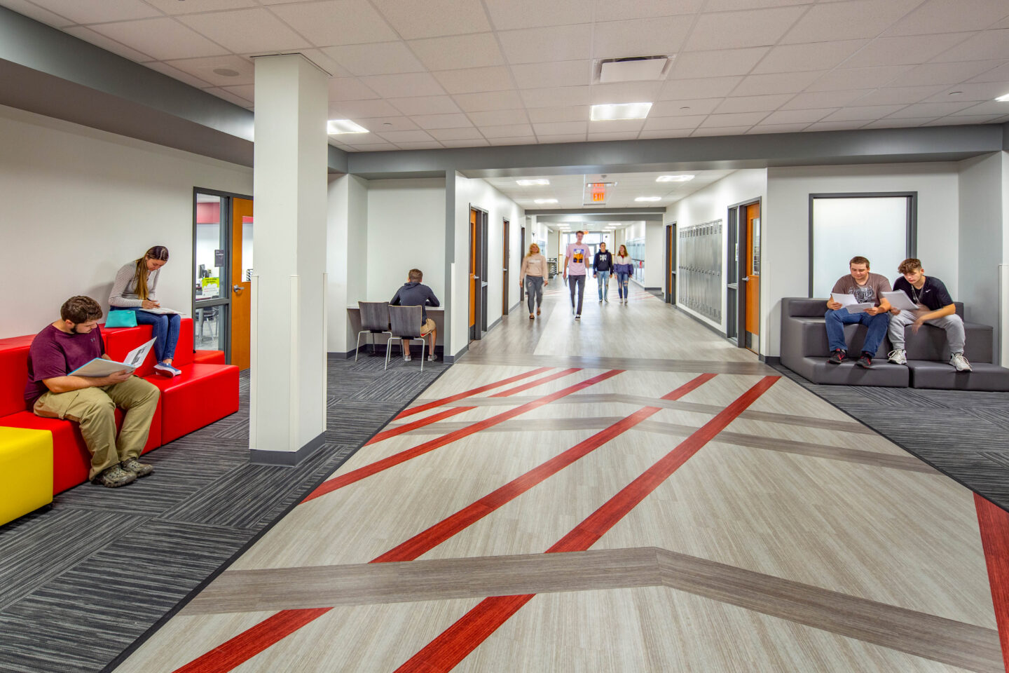 The collaboration hallway features seating for individual study and small group collaboration