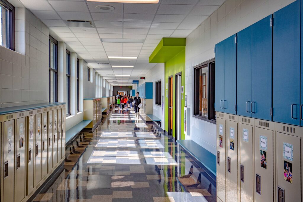 Large windows allow daylight into the corridors of the school