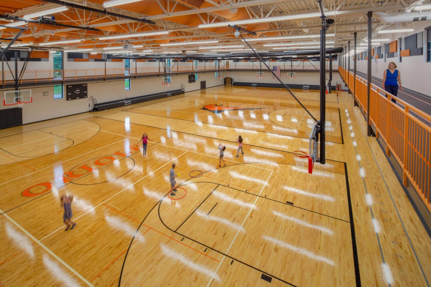 A view of the three-station gymnasium and the walking track mezzanine