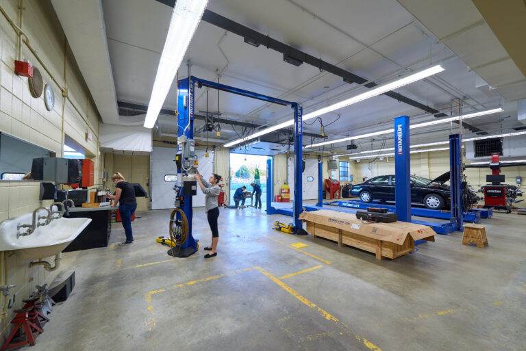 Garage doors lead into an updated auto shop space at Sheboygan North High School