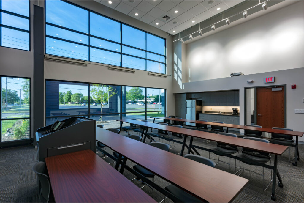 View toward the rear of a large, windowed conference room