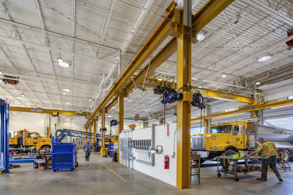 Ground-level view of a garage area where county vehicles are stored and serviced