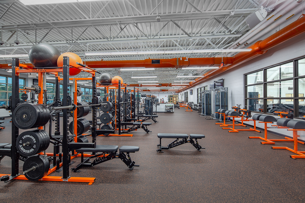 Weightlifting machines fill this view of the school's new fitness center