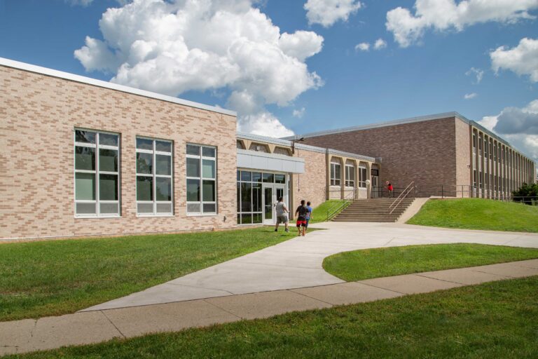 Sullivan Elementary School exterior of classroom addition with students walking