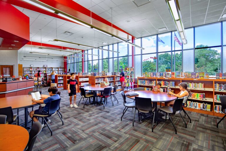 Fran Fruzen Intermediate School Library with students reading at tables