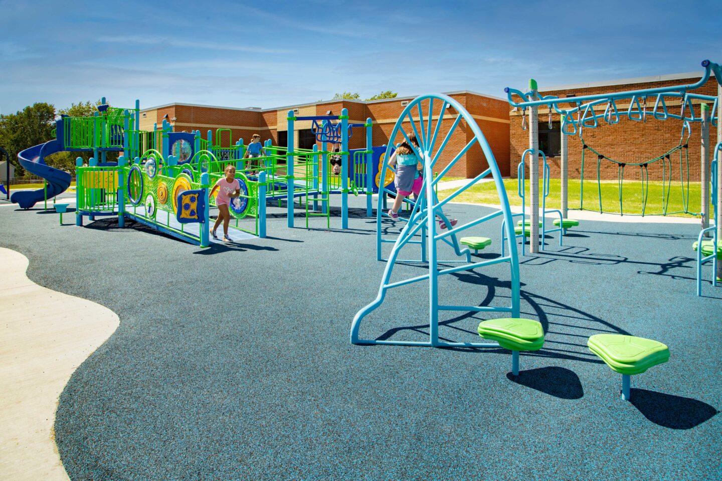 Herbert Hoover Elementary Playground with kids playing on the equipment