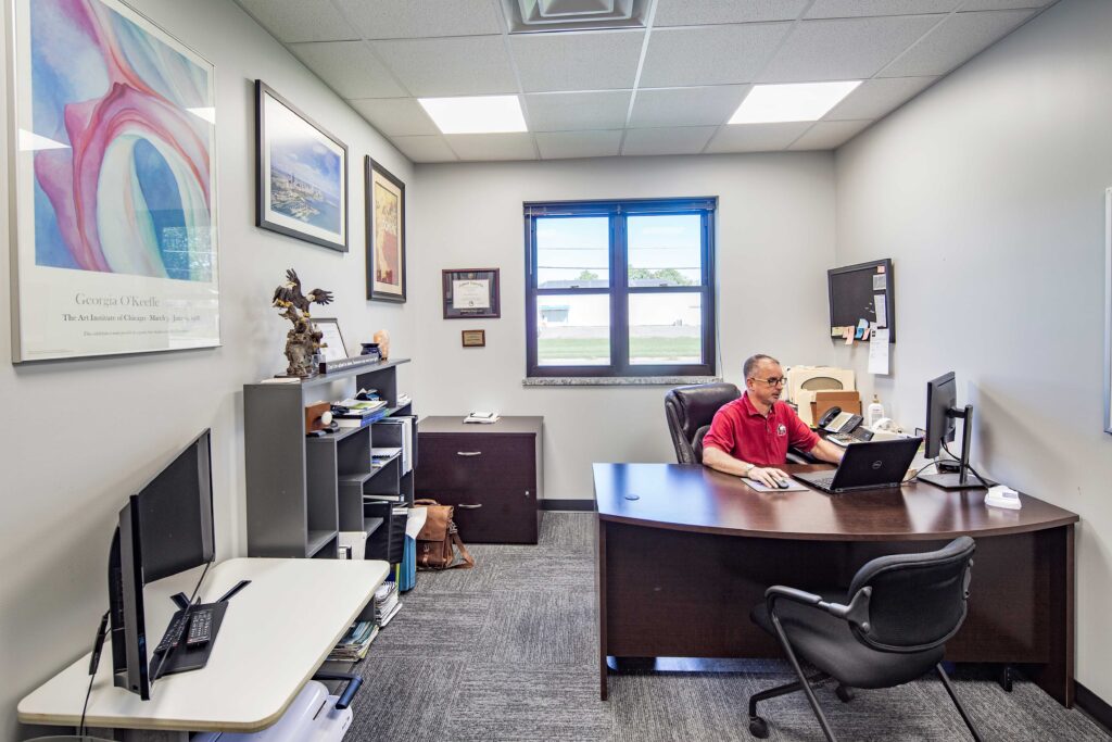 Camanche City Hall Administrator Office with employee working at desk