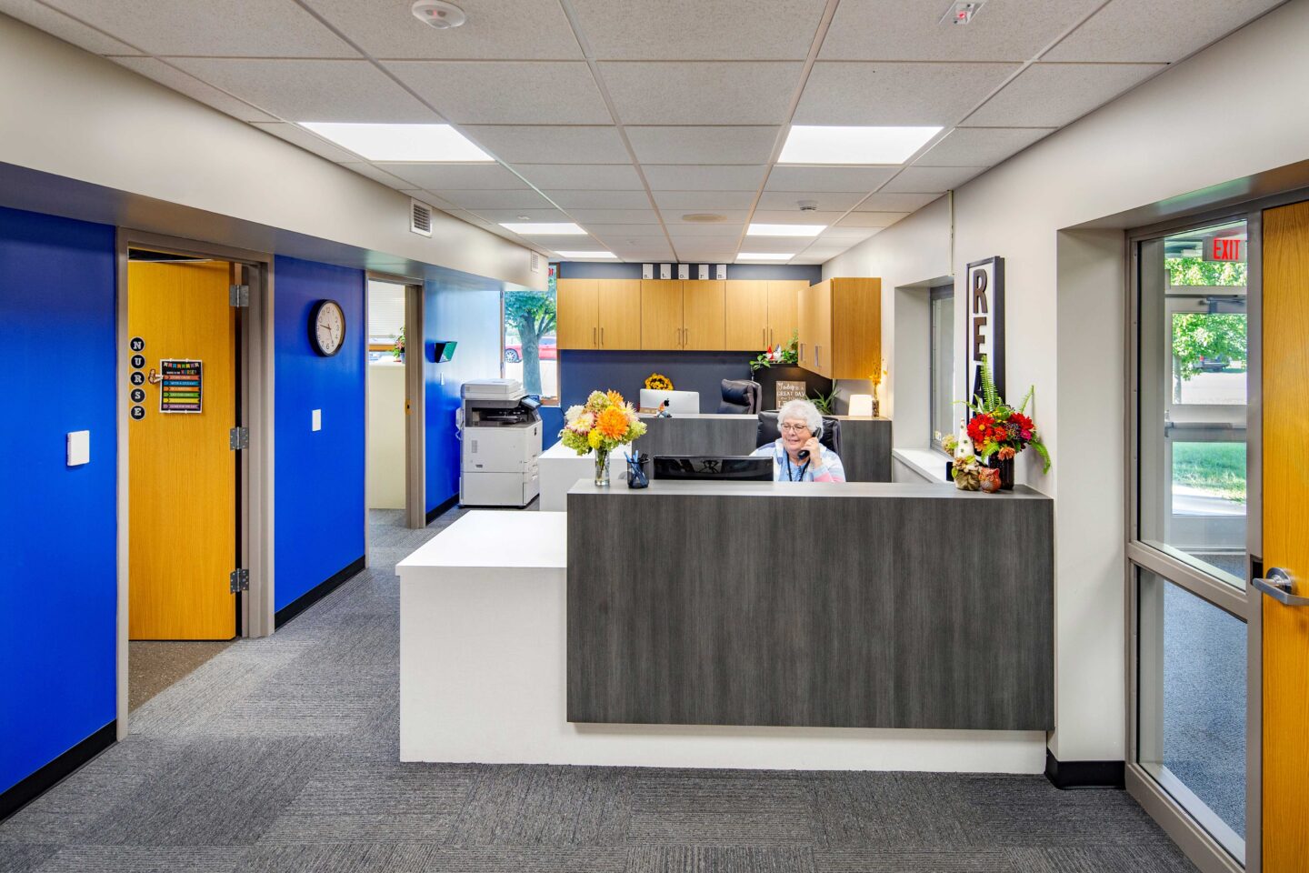 Camanche Elementary Reception Area with receptionist answering a phone call