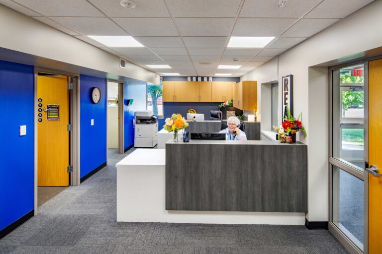 Camanche Elementary Reception Area with receptionist answering a phone call