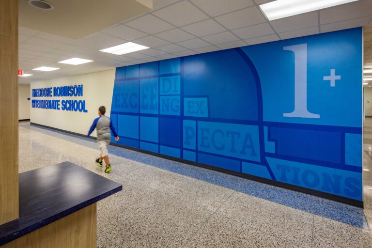 Theodore Robinson Intermediate School Lobby with branding graphic on the wall