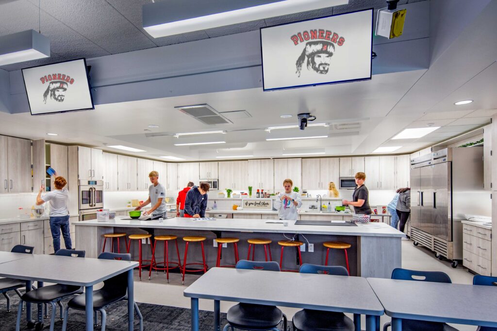 Sevastopol School District FACE room with students baking in the kitchen