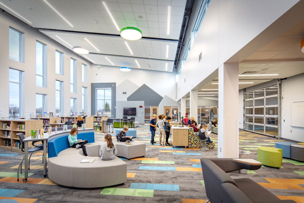 Garden Prairie Intermediate School library with students reading