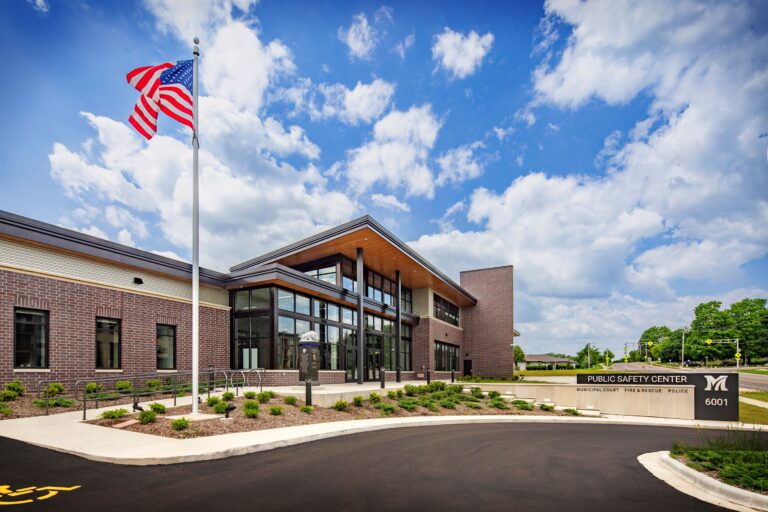 Main entrance with flag pole