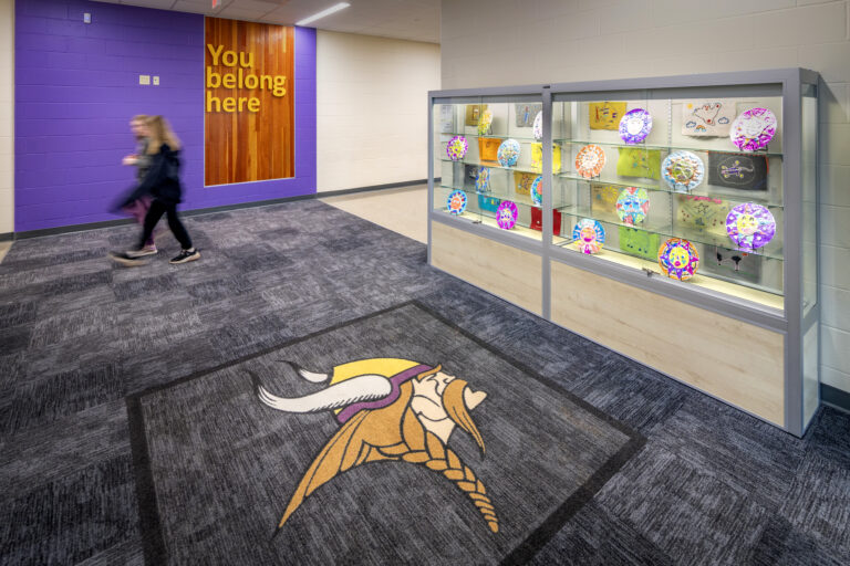 Rendering of the cafeteria with the branded wall at Denmark Elementary School