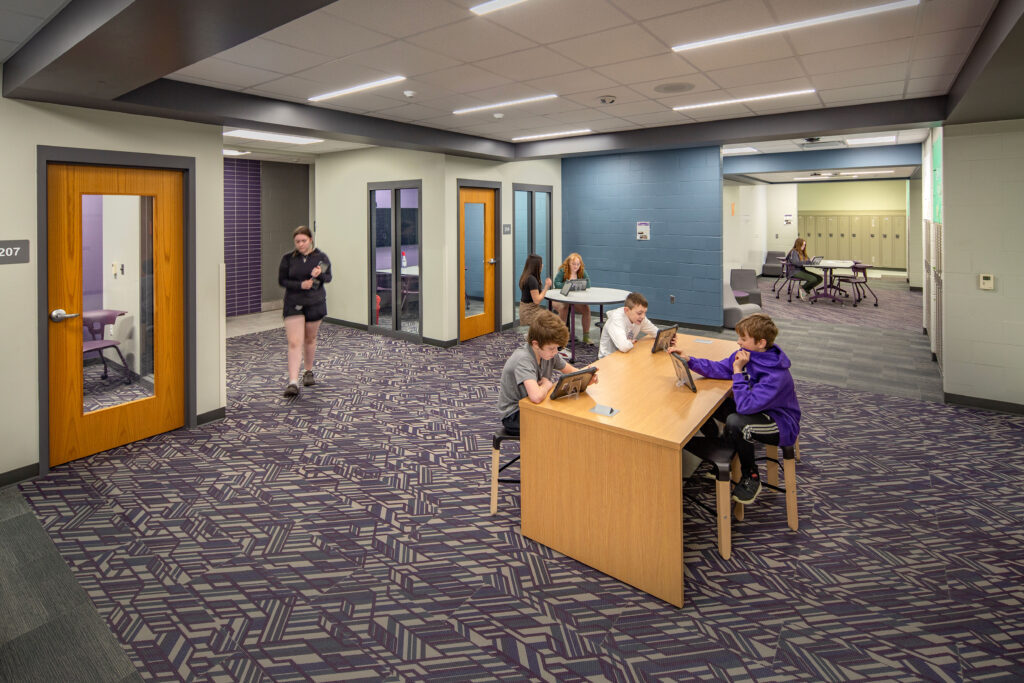 Collaboration space adjacent to classrooms for middle school students in the Dodgeland School District