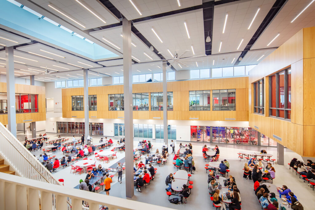 Commons/cafeteria from the second floor at Neenah High School looking into the media center on the second floor