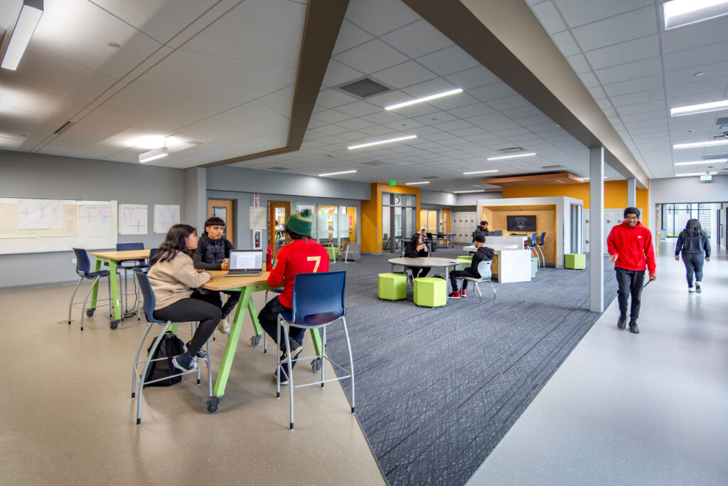 Learning commons with flexible furniture and a monitor