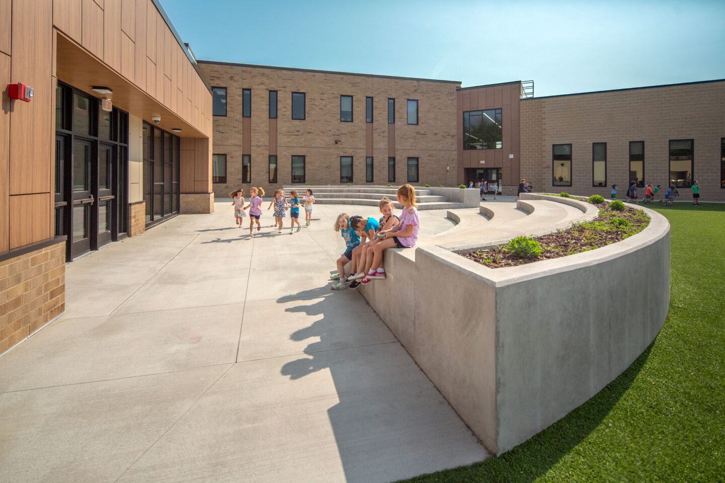Courtyard with outdoor classroom teaching steps at Columbus Elementary School
