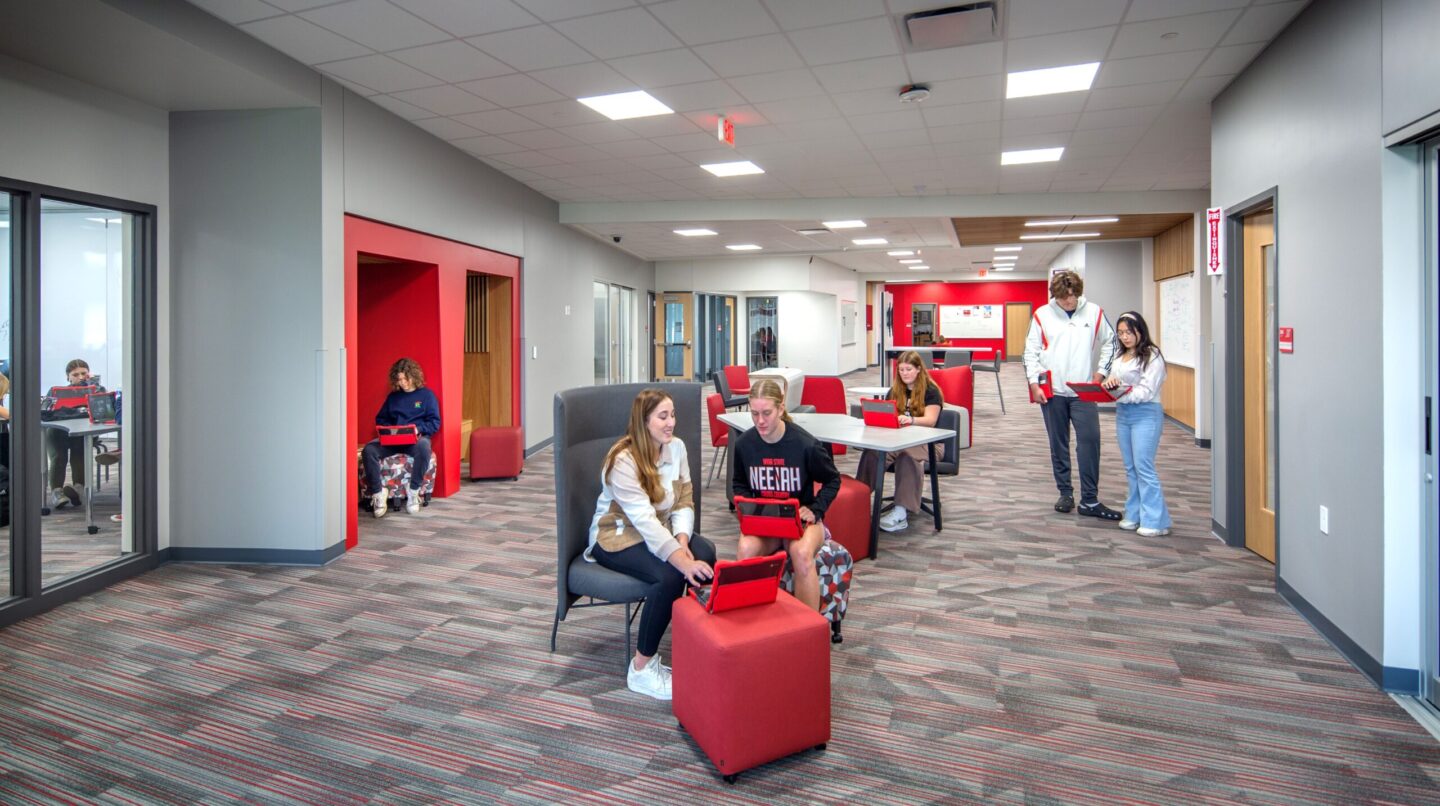 Neenah High School collaboration area with students working together and studying