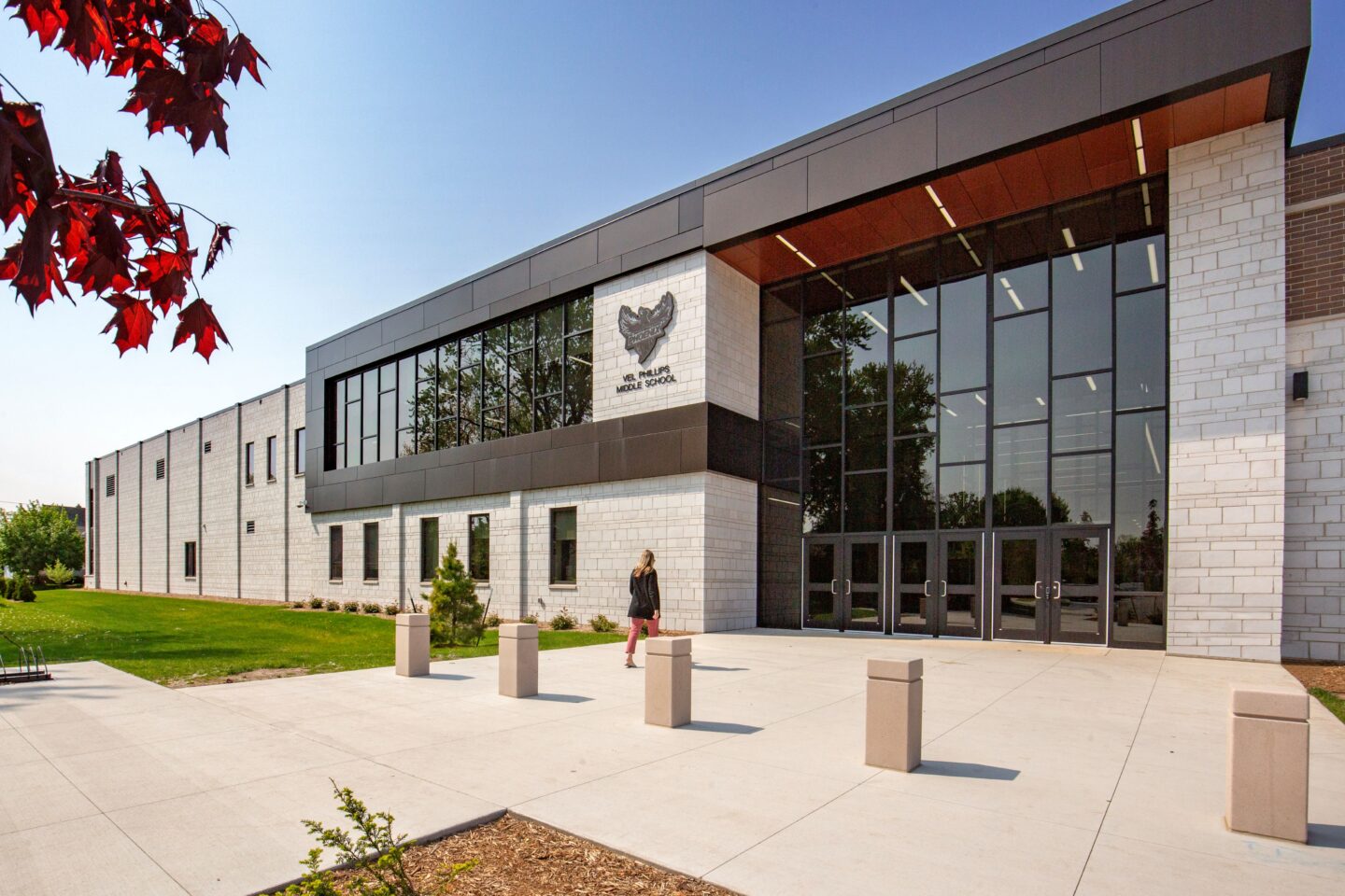 Athletic entrance with signage on building