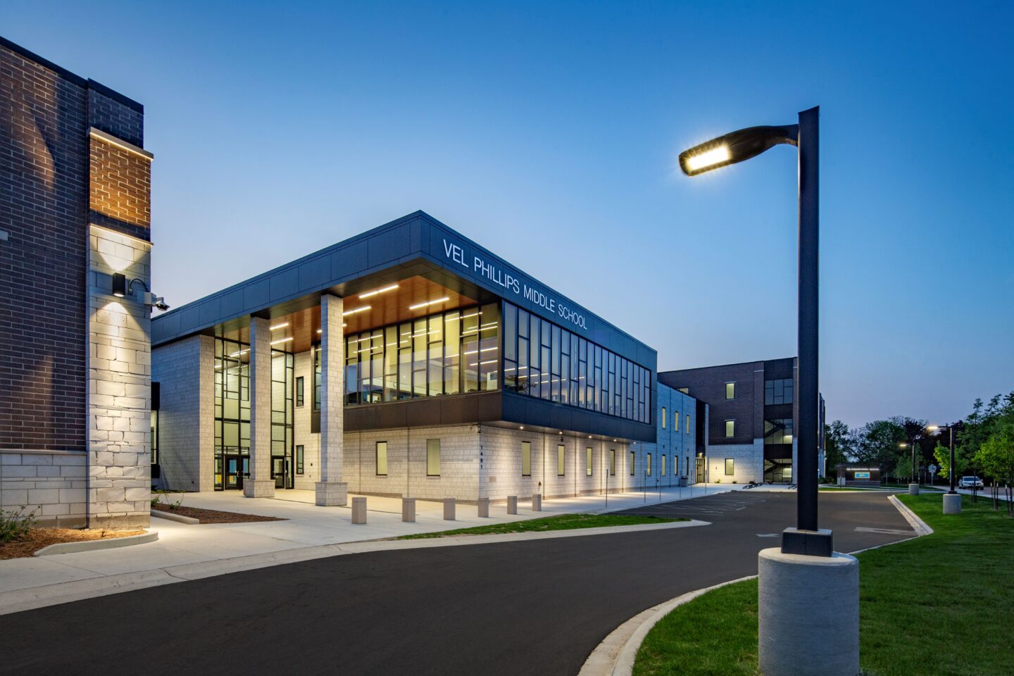Front entrance at night with interior lights on