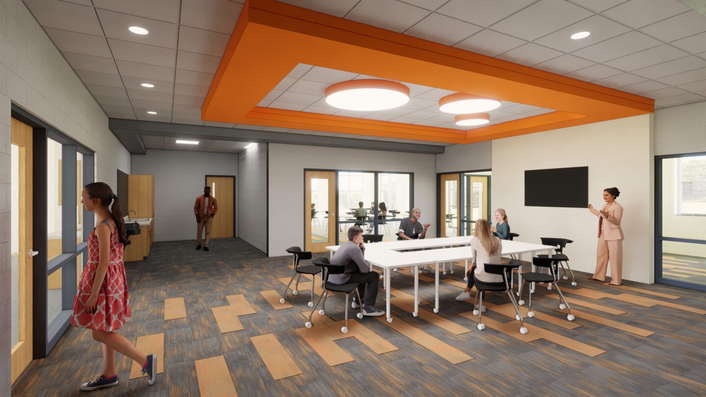 collaboration area with students learning together at big table