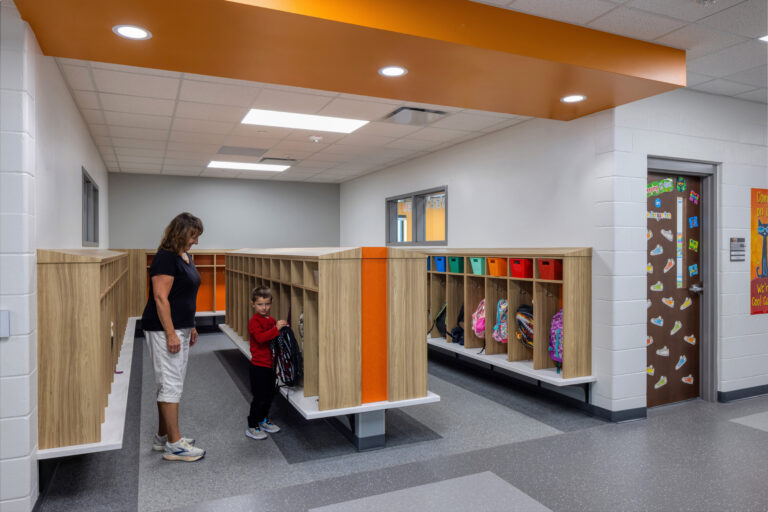 Pulaski Sunnyside Elementary's locker and cubby area with orange accents